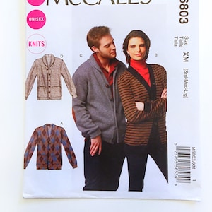 May include: A sewing pattern for a unisex cardigan, McCall's M6803, size XM (Small-Medium-Large). The pattern includes instructions for making a cardigan with a shawl collar and button closure. The pattern is for knit fabrics.