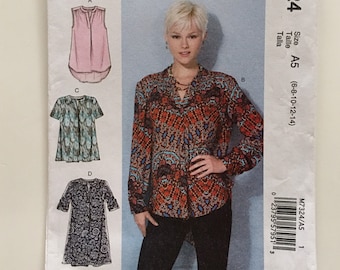 Patrón de costura sin cortar para blusas y túnicas con media tapeta McCall 7324, dobladillo alto y bajo, para mujeres de 6 a 14 años