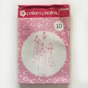 May include: A vintage sewing pattern for a dress, featuring three different views of the garment. The pattern is from Patterns Pacifica and is size 10. The pattern is pink and white with a floral design.