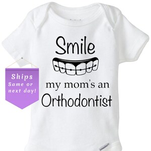 Orthodontist baby onesie, smile my moms an orthodontist, white baby bodysuit, braces shirt, mom baby shirt, baby shower git, newborn