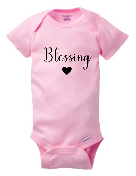 pink baby bodysuit