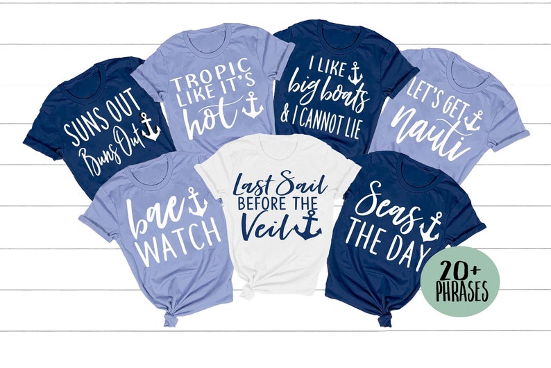 May include: A set of six blue and white t-shirts with nautical themed phrases and anchor designs. The phrases include "Suns Out Buns Out", "Tropic Like It's Hot", "I Like Big Boats & I Cannot Lie", "Let's Get Nauti", "Bae Watch", "Last Sail Before The Veil", and "Seas The Day".