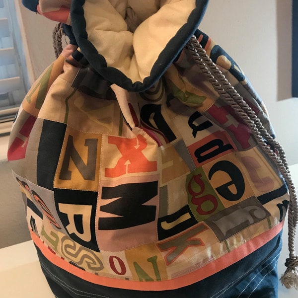 Perfect bag to take to Grandma's house.  Stow clothes, toys, or precious treasures and your little tike is ready to go.