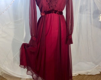 Vintage 1970’s Miss Elliette burgundy crepe boho gown with ruffled neckline and long sheer sleeves