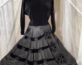 1950’s black taffeta and velvet full circle dress with dolman-style sleeves