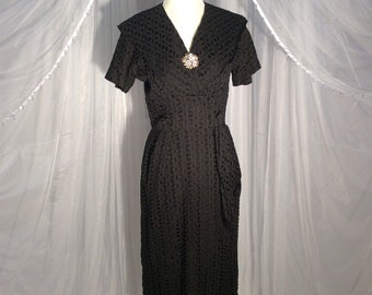 Vintage 1950’s black cotton eyelet sheath dress with wide collar