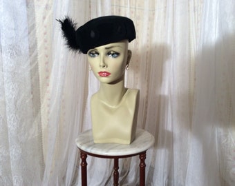 1950’s  Valerie Mode black“ velour imported fur” felt pillbox hat with side feathers and self- hat pin.