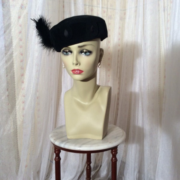 1950’s  Valerie Mode black“ velour imported fur” felt pillbox hat with side feathers and self- hat pin.