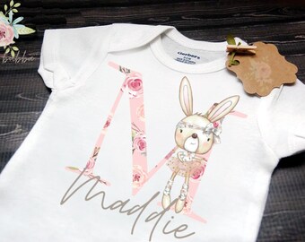baby clothes with bunnies on them