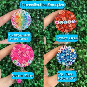 May include: Four personalized badge reels with different designs and names. The top left reel has a rainbow background with the letters RN, a star, and BSN. The bottom says Hannah. The top right reel has a red background with white letters spelling Alexa. The bottom left reel has a pink background with white letters spelling Haley. The bottom right reel has a blue background with white letters spelling Blake and RVT.