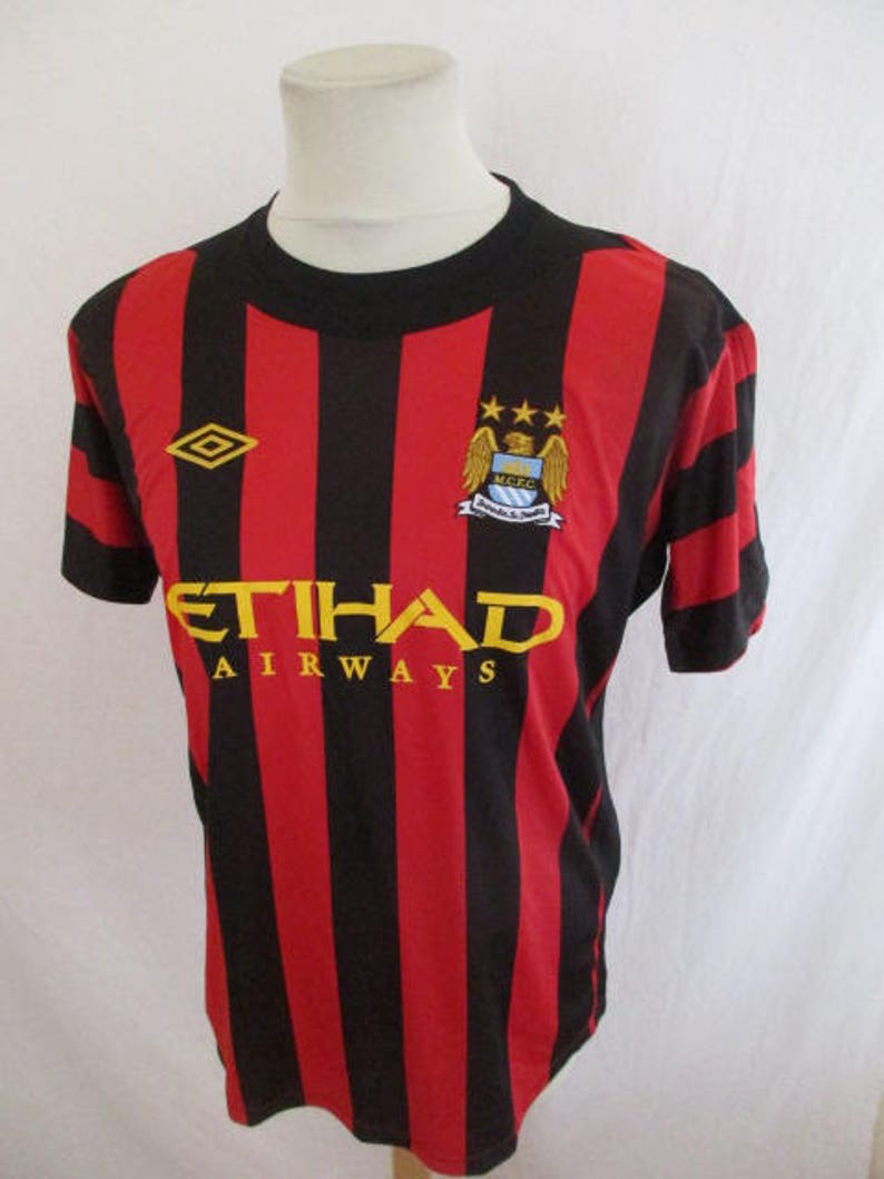 manchester city red jersey