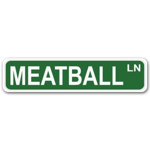 Placa de rua de alumínio Meatball Lane 4" x 17"