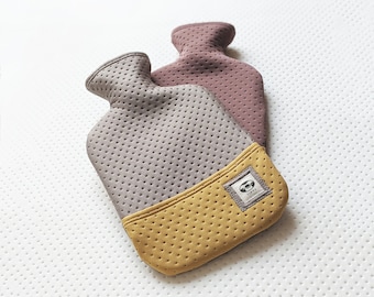 Hot Water Bottle (2 Litre) with the super soft grey neoprene cover to stay warm all year round.