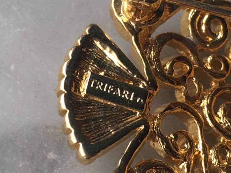 Vintage Trifari Figural Angel Fish Brooch Pin Gold Tone Rhinestone Eye Openwork Scroll Swirl Tropical Undersea Marine Animal Costume Jewelry