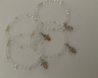 Crystal stretch bracelet with hanging angel charm