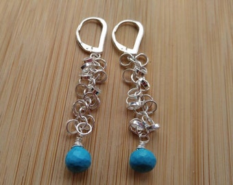 Turquoise and sterling silver earrings, leverback earrings studded with Rhinestones and long dangling silver circles.