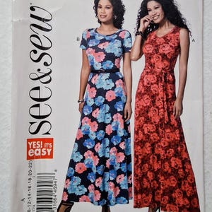 May include: A sewing pattern for two maxi dresses. One dress features a navy blue background with blue and pink floral print, and the other is red with a rose pattern. The pattern includes the text "see & sew" and "YES! It's easy".