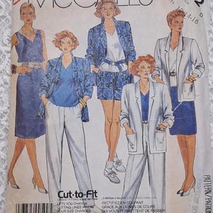 May include: Vintage McCall's sewing pattern with illustrations of women's clothing designs. The pattern includes a dress, shorts set, and pantsuits. The cover features the text "Easy McCall's" and the pattern number 2412. The size range is 12-14-16.