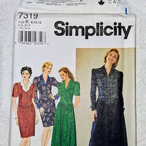 May include: Simplicity sewing pattern 7319, size K, for dresses. The envelope features illustrations of four different dress styles: a red dress with a white collar, a blue patterned dress, a green dress, and a long-sleeved plaid and solid blue dress.