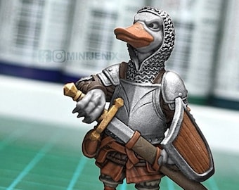 May include: A miniature figurine of a duck wearing armor and holding a sword. The duck is standing on a round base. The figurine is unpainted and comes with a round base.