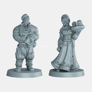 May include: Two painted figurines of a man and a woman, both wearing medieval clothing. The man is holding a tankard and the woman is holding a tray with mugs.