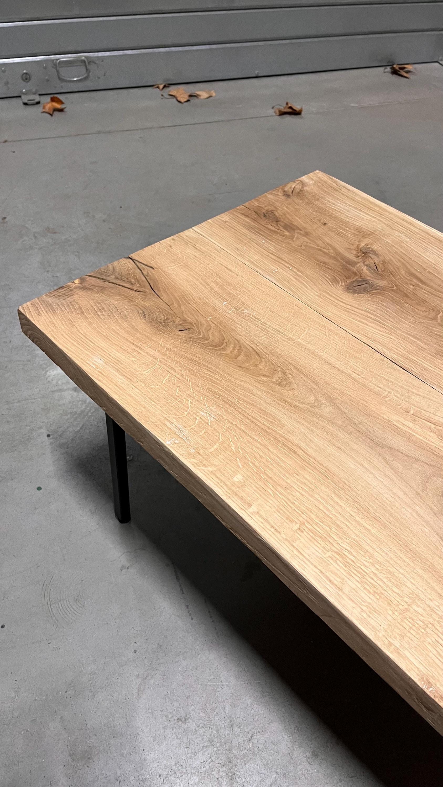Solid oak wood coffee table on thin straight designer legs