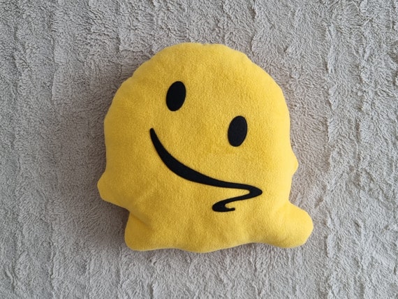 Melting Face emoji pillow