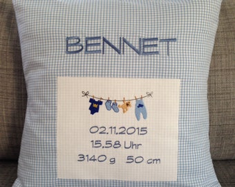 Name cushions with dates of birth