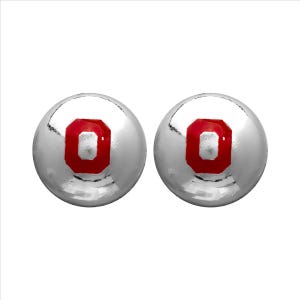 May include: A pair of round, polished silver stud earrings. Each earring features a smooth, reflective metallic surface with a centered, bold red block letter O emblem. The design is symmetrical, showcasing a clean, circular shape with a high-gloss finish.