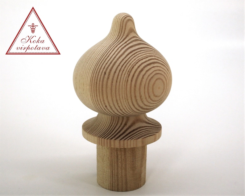 May include: A wooden finial with a rounded top and a base. The finial is made of natural wood with a light brown color and a grain pattern.