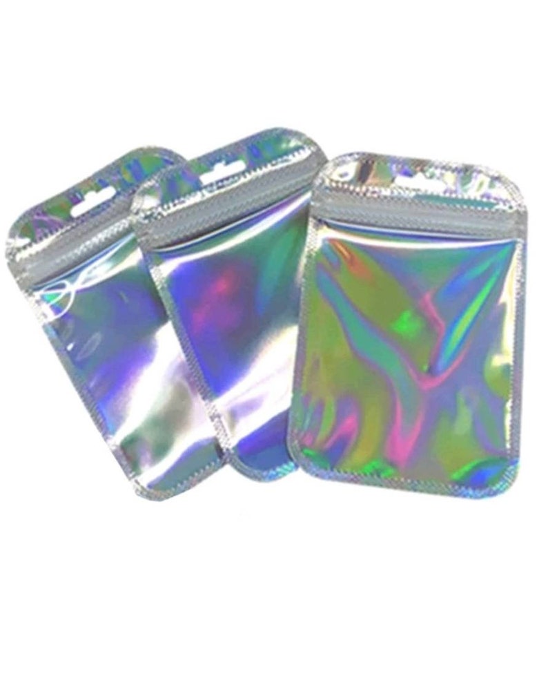 May include: Three iridescent clear plastic zippered bags with a hanging hole at the top.