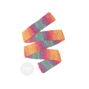 May include: A long, colourful crochet scarf in shades of pink, orange, yellow, and blue. The scarf is made with a simple stitch pattern and has a slightly textured look.
