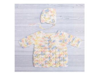 Hand Crocheted cardigan and bonnet for a newborn baby girl white and rainbow fleck