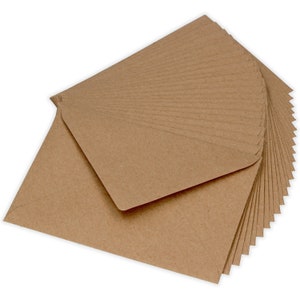 May include: A stack of brown kraft paper envelopes. The envelopes are folded and ready to be used for mailing.
