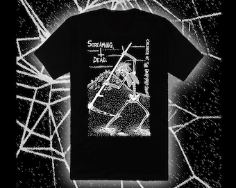 May include: Black t-shirt featuring a white graphic of a skeleton figure with a spear, and the text "SCREAMING DEAD." Additional text reads "CHILDREN OF THE BONEWARD SOULS." The design is a detailed, illustrative style.