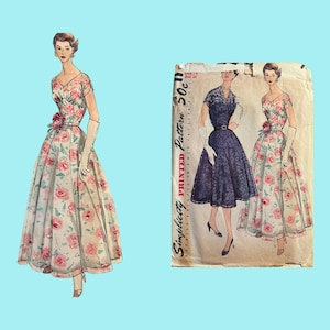 May include: Vintage dress pattern featuring a floral print dress with a V-neck and a full skirt. The pattern includes a drawing of the dress and the text "Simplicity Printed Pattern 50c". The dress has a pink rose design.