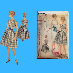 May include: Vintage Simplicity sewing pattern featuring illustrations of dresses. The main dress is a sleeveless plaid design with a bow detail. The pattern includes a white dress with a blue sash. The pattern is marked "Simple to Make".