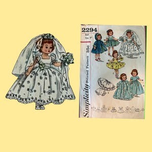 May include: A Simplicity 2294 printed sewing pattern for 8 inch dolls. The envelope features illustrations of dolls wearing various outfits, including a white wedding dress with a veil and bouquet, a blue hooded cape, and several colorful dresses.