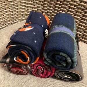 Fleece &quot;sit-upon&quot; mat with waterproof backing.