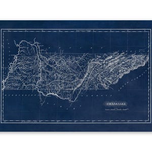 May include: A dark blue map of Tennessee featuring white line work detailing rivers, topography, and state borders. The map includes a grid overlay, a scale bar, and the text TENNESSEE printed in a serif font in the lower right corner.