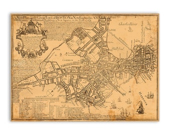 May include: An antique map of Boston, Massachusetts, from 1769. The map shows the layout of the city, including streets, buildings, and the Charles River. The map is in black and white and has a vintage look.