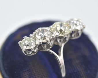 Circa 1920 Antique Platinum Old Mine/Old Euro Cut Diamond 4-Stone Ring