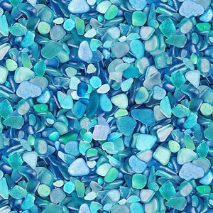 May include: A close-up image of a collection of sea glass in various shades of blue and green. The glass pieces are smooth and rounded from being tumbled by the ocean.