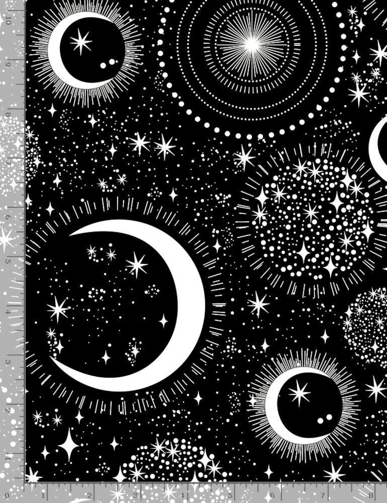 May include: Black fabric with a white celestial pattern. The design features crescent moons, stars, and circular sunbursts. The fabric has a cosmic theme, suitable for apparel or home decor projects.