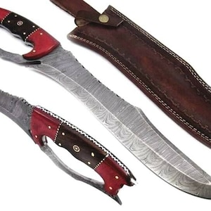 May include: A Damascus steel knife with a red and black handle and a leather sheath. The blade has a wavy pattern and the handle has a unique design.