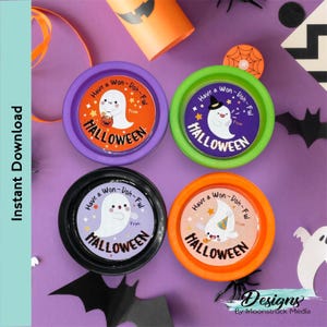 May include: Four round containers with lids, each featuring a different color lid and a Halloween-themed sticker with a ghost and the text "Have a Won-Doh-Ful Halloween".