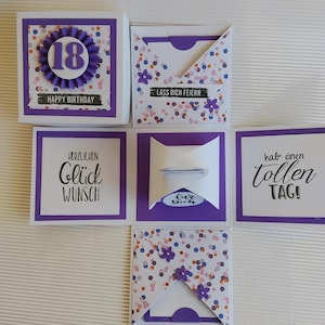 Könnte beinhalten: Eine quadratische lila-weiße Explosions-Geschenkbox mit Konfetti-Mustern, einer lila Rosette mit der Zahl 18 und Texten wie Happy Birthday, Herzlichen Glückwunsch, Lass dich feiern, für dich und hab einen tollen TAG.