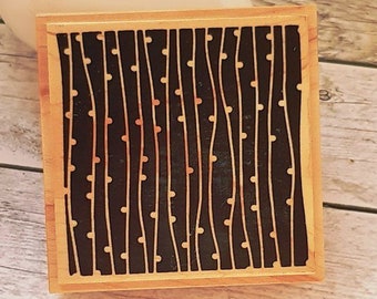Sello de madera con fondo de perla