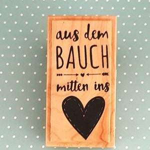 Holzstempel "aus dem Bauch mitten ins "Herz""