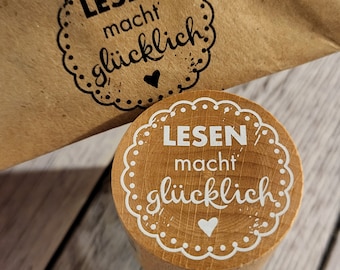 Holzstempel rund "Lesen macht glücklich"